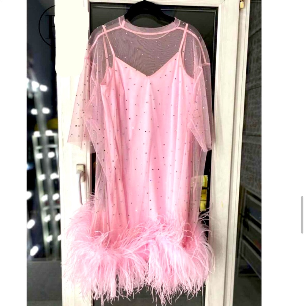 A brand new, fantastic, shiny dress from the T-Dress brand, not worn